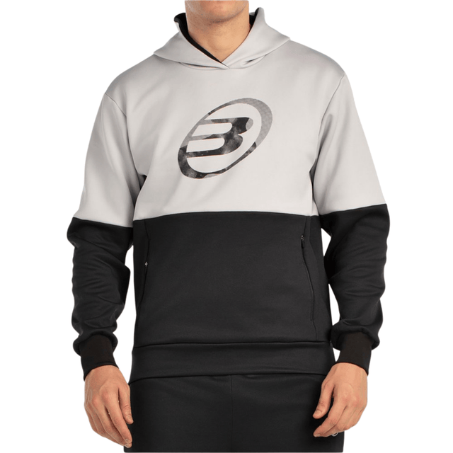 Vooraanzicht van de grijs met zwarte Bullpadel Hoodie Boyal met groot logo