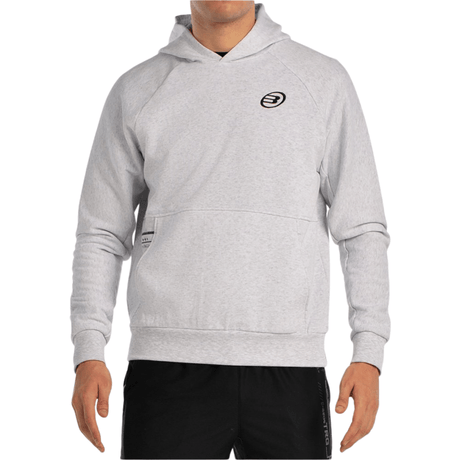 Vooraanzicht van de lichtgrijze Bullpadel Hoodie Breas met capuchon en borstlogo