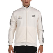 Vooraanzicht van het gebroken witte Bullpadel Jacket Pindaro met logo op de borst