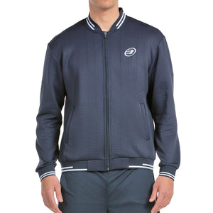 Vooraanzicht van het donkerblauwe Bullpadel Jacket Trombe met witte streepboorden