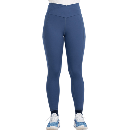Model draagt de blauwe Bullpadel Cujan legging voor dames met hoge taille, vooraanzicht