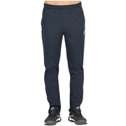 Vue de face du pantalon Bullpadel Pants Brome bleu foncé, avec le logo sur la jambe droite