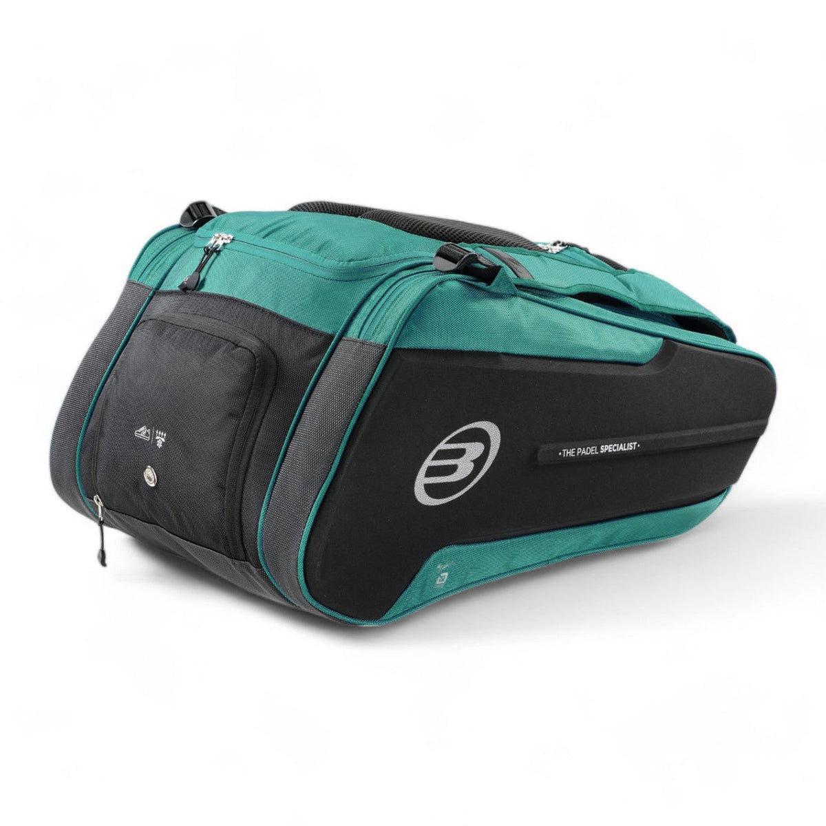 Zijkant van de grijs-petrolblauwe Bullpadel Hack 2025 racketbag met schouderband.