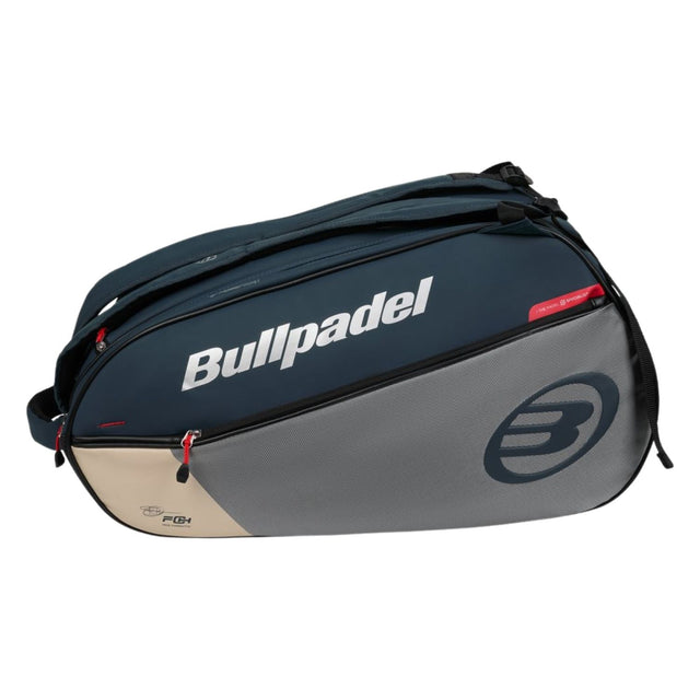 Zijaanzicht van de Bullpadel Neuron 2026 in donkerblauw met grijs paneel en beige hoekstuk