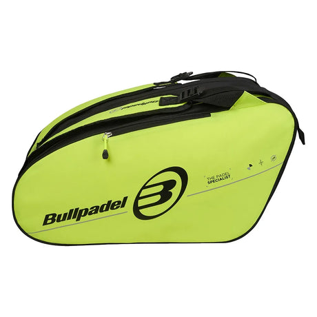 Zijaanzicht van de Bullpadel Tour 2026 in fluorgeel met zwarte handgreep en zwart logo