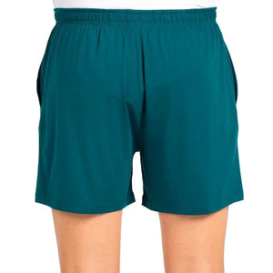 Schuin aanzicht van de petrolgroene Bullpadel Short Lijar met elastische tailleband