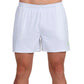 Vooraanzicht van de witte Bullpadel Short Lijar met lichtgroen logo op de linkerpijp