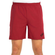 Vue de face du short Bullpadel Mazari couleur bordeaux, avec le logo Bullpadel blanc sur la jambe