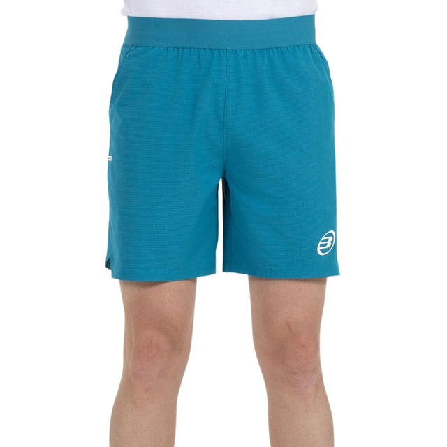 Bullpadel Moncada short voor heren in turquoise, vooraanzicht met logo