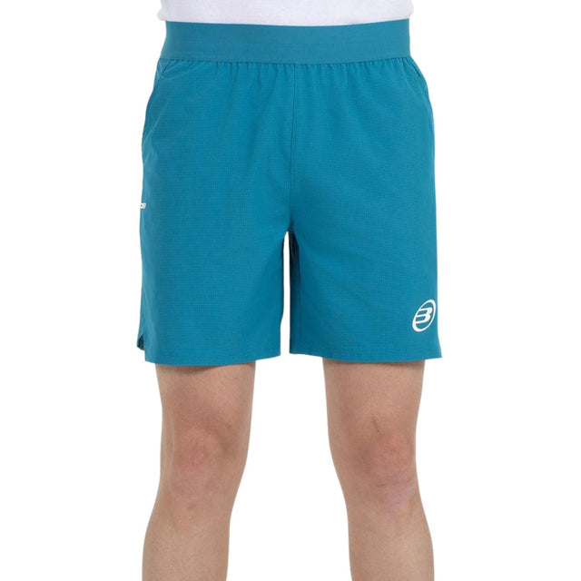 Bullpadel Moncada short voor heren in turquoise, vooraanzicht met logo