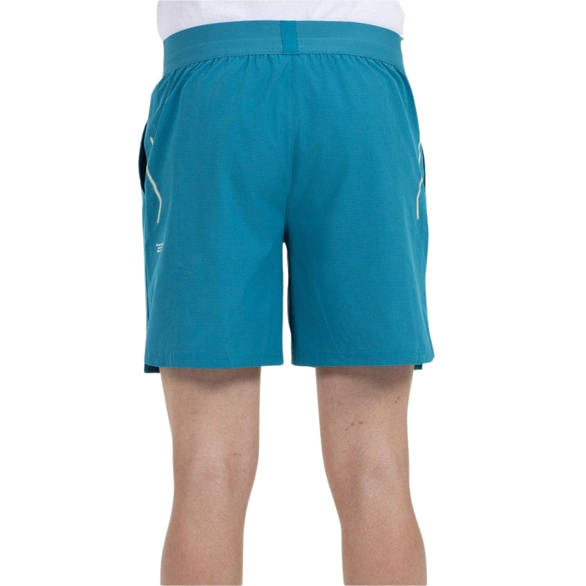 Turquoise Bullpadel Moncada short van opzij met split in de pijp