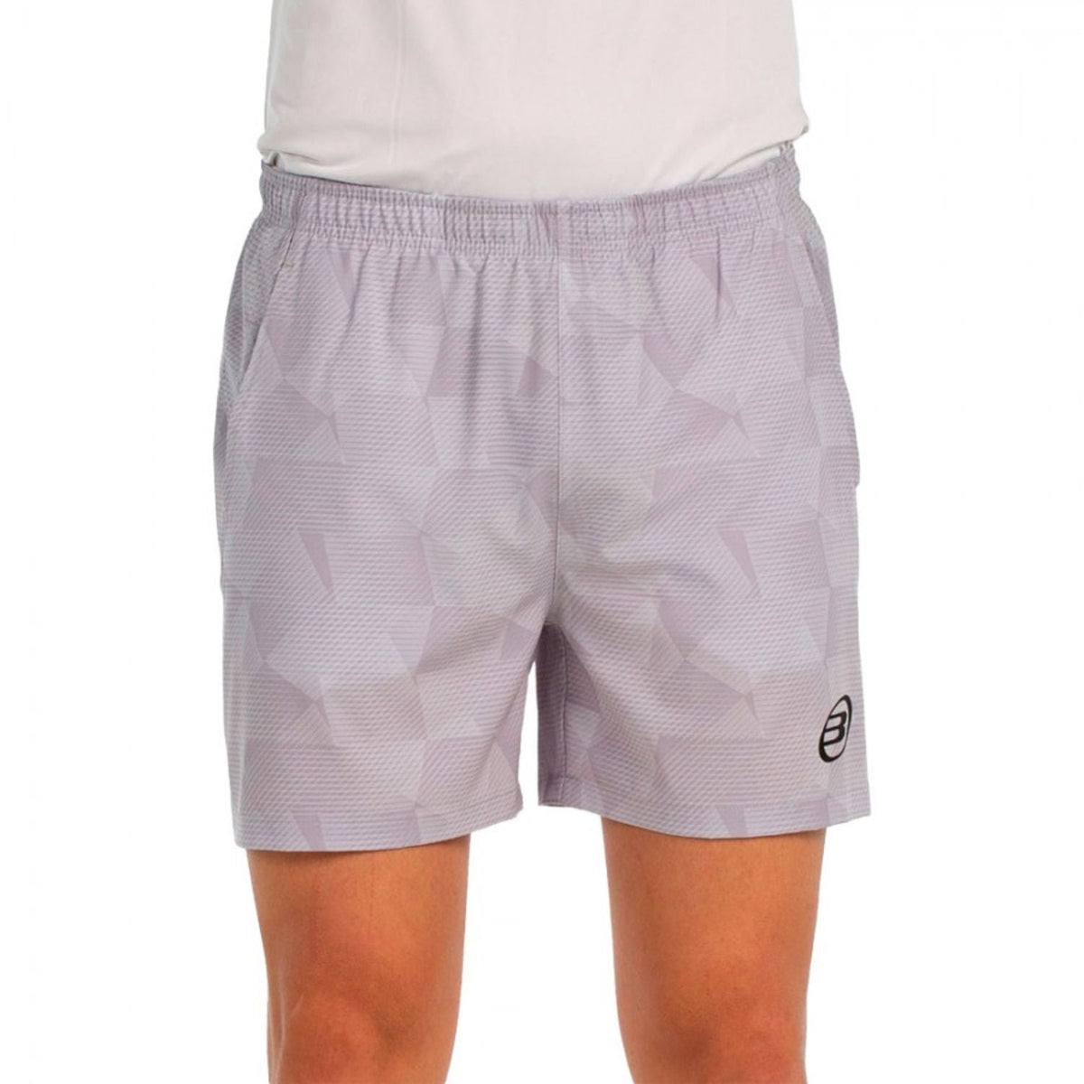 Vooraanzicht van de grijsbeige Bullpadel Short Monch met vlakkenprint en zwart logo