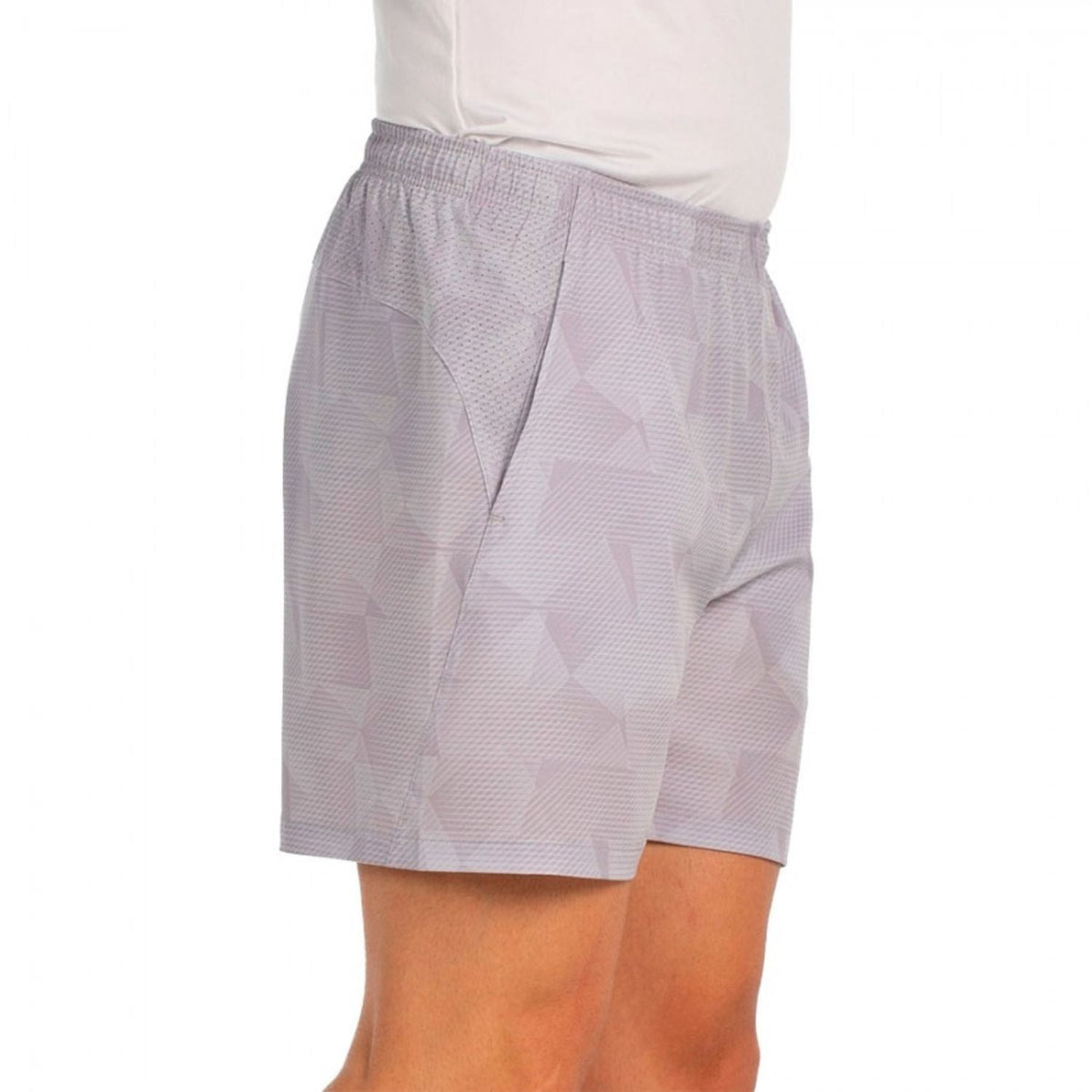 Zijaanzicht van de grijsbeige Bullpadel Short Monch met steekzak op de heup