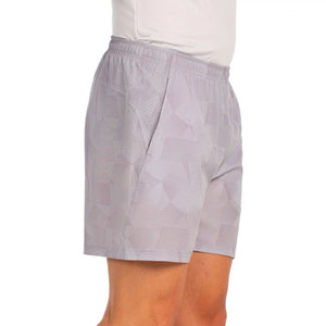 Zijaanzicht van de grijsbeige Bullpadel Short Monch met steekzak op de heup