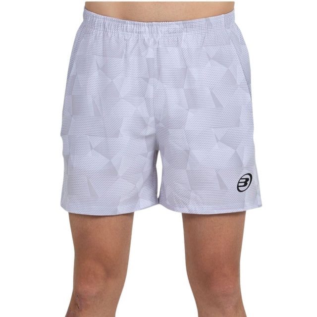 Vooraanzicht van de witte Bullpadel Short Monch met subtiele vlakkenprint en logo