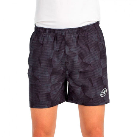Vooraanzicht van de antracietgrijze Bullpadel Short Monch met wit logo op de pijp