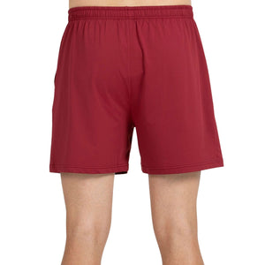 Achteraanzicht van de bordeauxrode Bullpadel Short Monfort met elastische taille