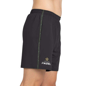 Zwarte Bullpadel Preux short van opzij met groene contrastbies