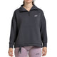 Donkergrijze Bullpadel Alasia sweater gedragen met lila legging