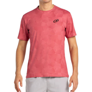 Vooraanzicht van het koraalroze Bullpadel T-Shirt Macondo met zwart logo op de borst