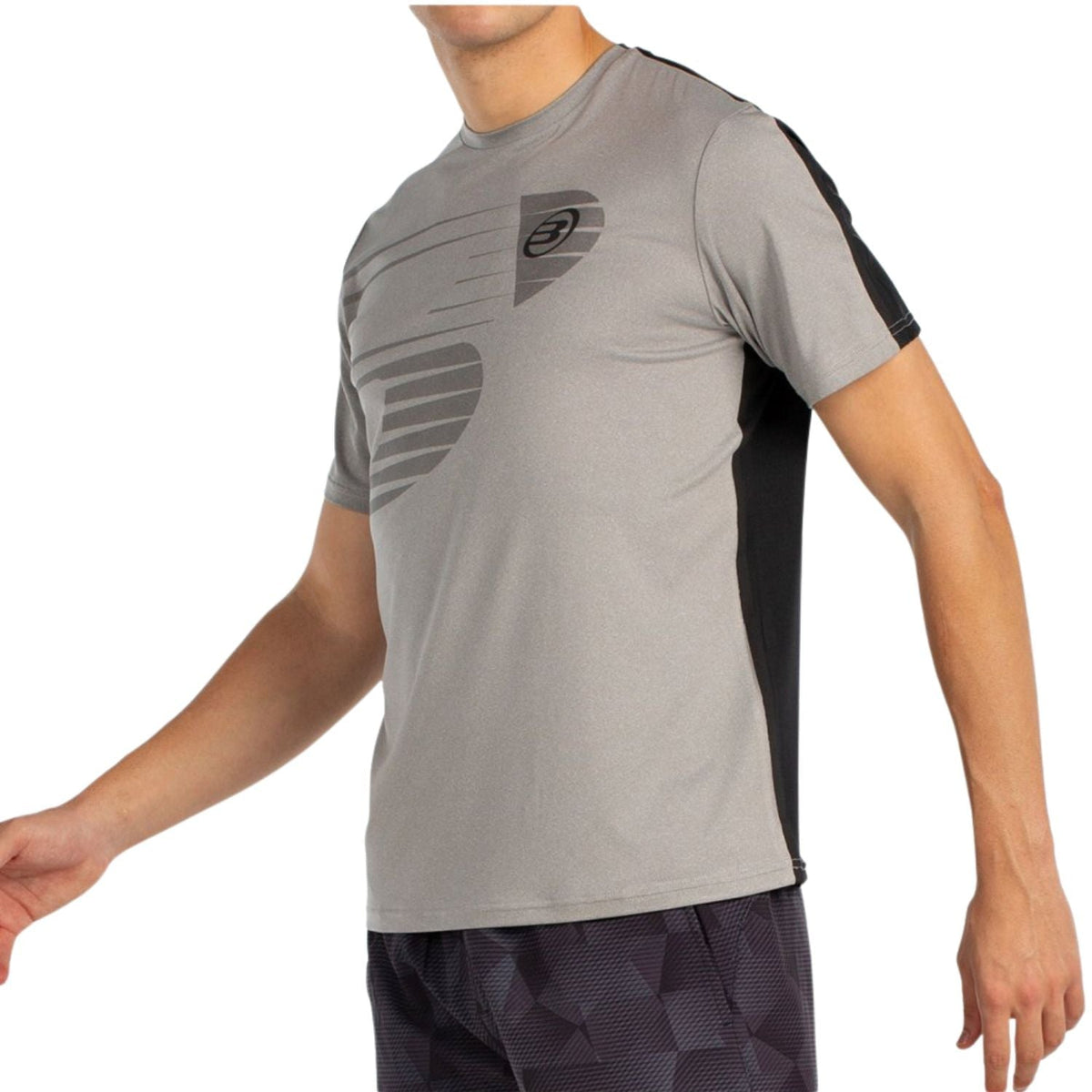 Schrägansicht des hellgrauen Bullpadel-Shirts „Moeche“ mit schwarzen Seiteneinsätzen