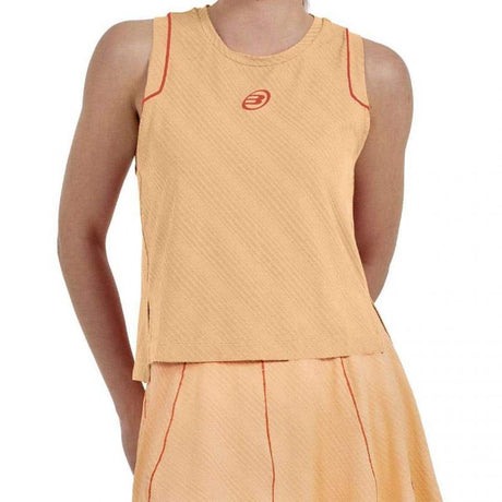 Bullpadel Amalia mouwloos shirt voor dames in lichtoranje met bijpassende rok