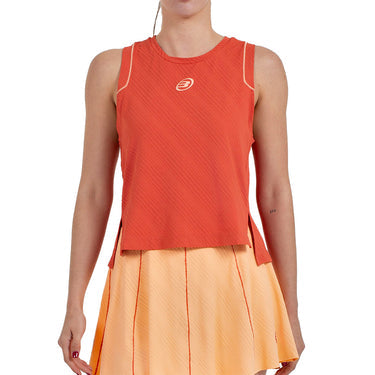 Koraalrood Bullpadel Amalia mouwloos shirt met oranje padelrok, vooraanzicht