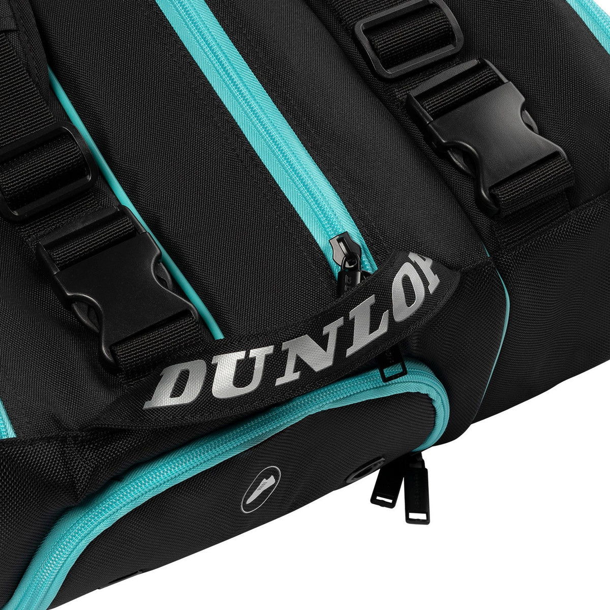 Detail van de clipsluiting en schouderbandbevestiging van de zwarte Dunlop Elite padeltas