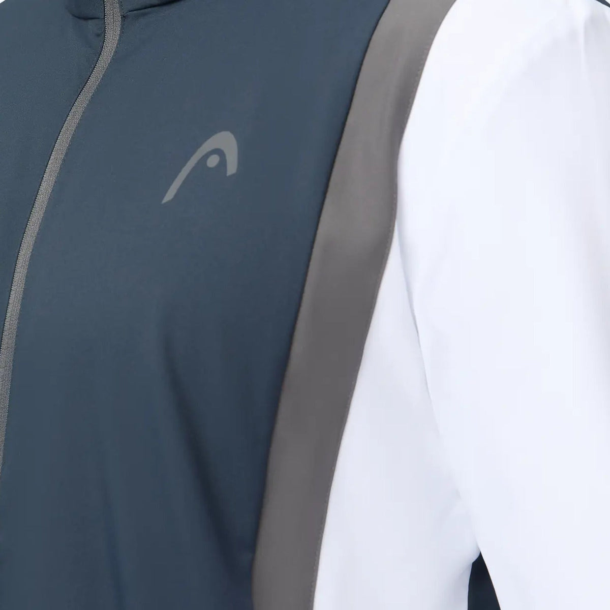 Detail van het Head Club 25 Jacket in Navy/White - HEAD-logo, rits en grijze contrastbies van dichtbij