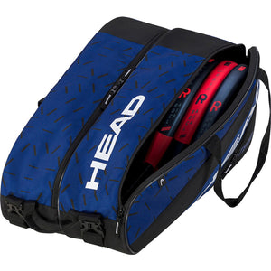 Geopende blauwe Head Team L racketbag met twee rode rackets in het hoofdcompartiment