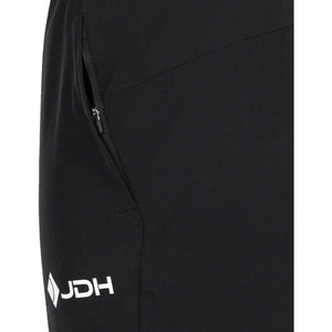Detail van de zwarte ritszak en het witte logo op de JDH Carbon Pro Light broek