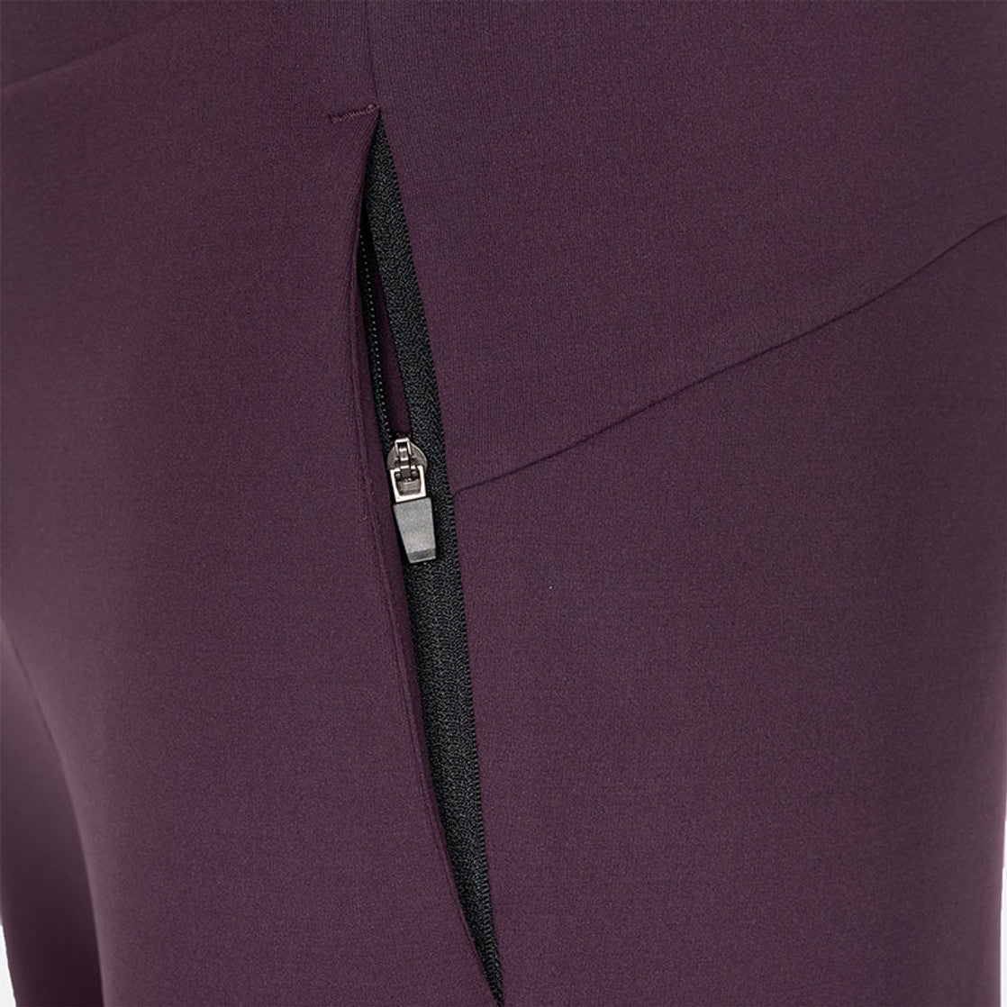Detail van de ritszak van de aubergine JDH Performance broek