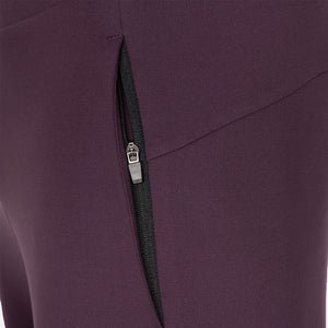 Detail van de ritszak van de aubergine JDH Performance broek