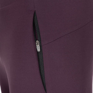 Detail van de ritszak van de aubergine JDH Performance broek