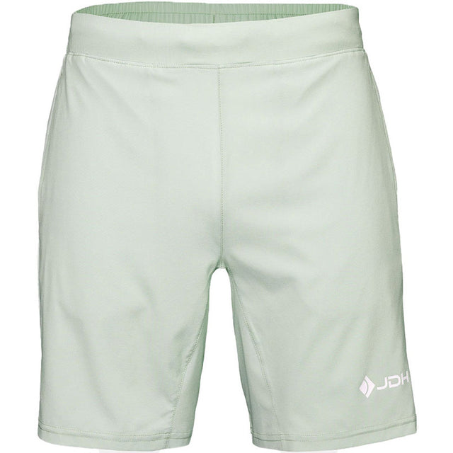 Vooraanzicht van de mintgroene JDH Performance Short met JDH-logo op de rechterpijp
