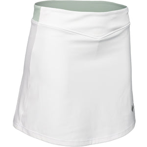 Schuin vooraanzicht van de witte JDH Performance Skirt met puntige mintgroene taille