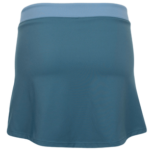 Achterkant van de petrolblauwe JDH Performance Skirt met lichtblauwe band en A-lijn