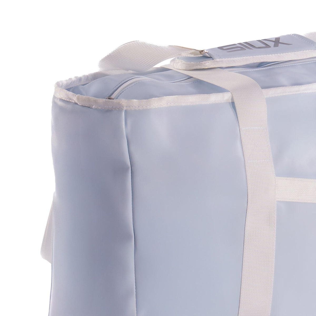 Detail van de bovenrand en rits van de lichtblauwe Siux The Queen Bag 2026 met draagband