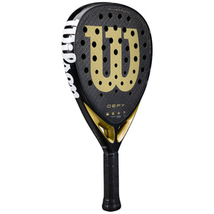 Raquete de padel Wilson Defy V1, vista frontal oblíqua, formato de diamante em preto com detalhes dourados