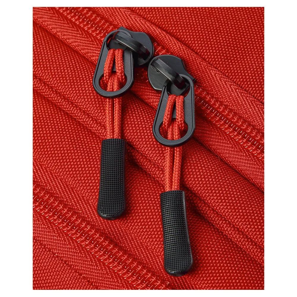 Detail van de ritstrekkers van de Wilson Tour padeltas in rood en zwart