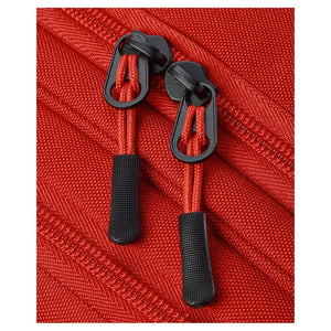 Detail van de ritstrekkers van de Wilson Tour padeltas in rood en zwart